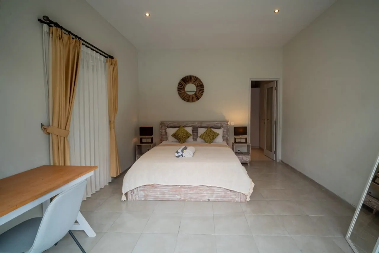 Air-conditioned bedroom with desk
